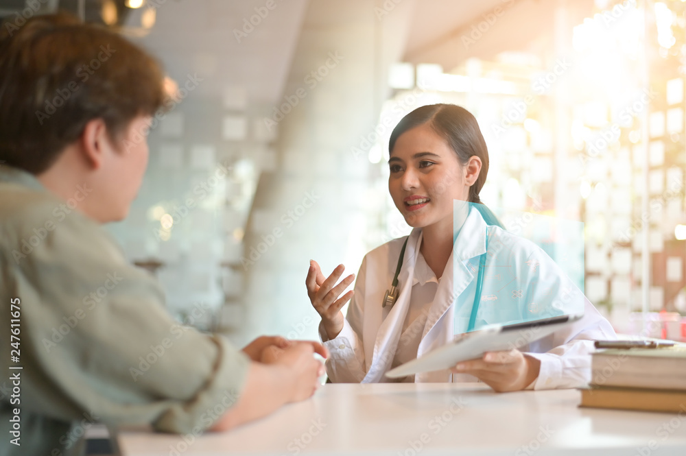 Doctor woman consulting patient sitting at doctor office. medical service system of smart hospital technology. Doctor woman consulting patient sitting at doctor office. medical service system of smart hospital technology.