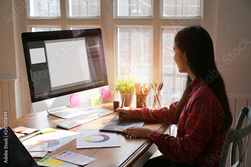 Graphic designer woman working on creative office with create graphic on computer.