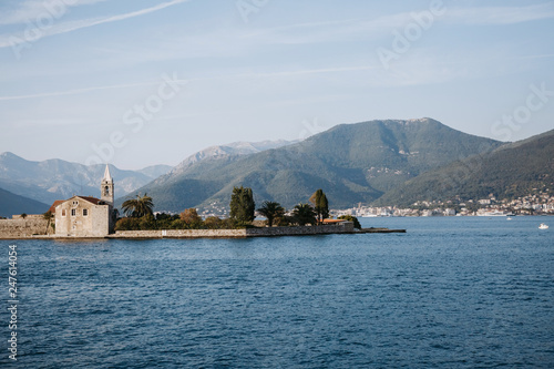 Lonely church on the island in the middle of a lake