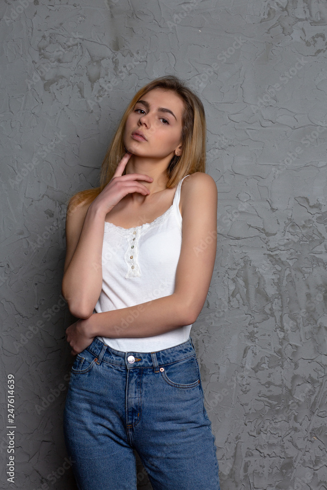 Test shooting for lovely young model wears fashionable apparel, posing at studio Test shooting for lovely young model wears fashionable apparel, posing at studio