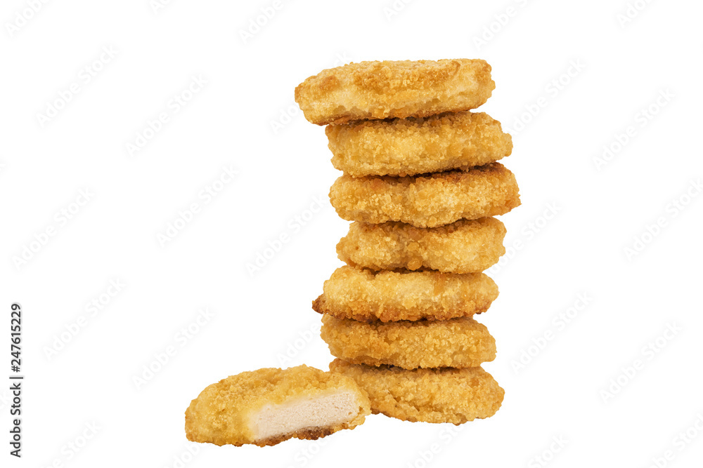 Pile of chicken nuggets isolated on a white background. Copy space for your text our your image. Cut out. Pile of chicken nuggets isolated on a white background. Copy space for your text our your image. Cut out.