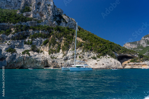 Yachts and boats with vacationists at the east shore. © arkady_z
