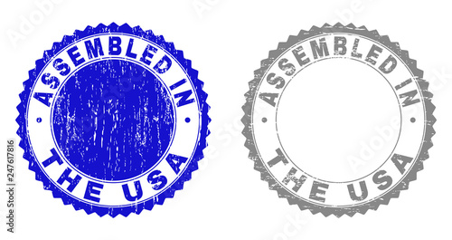 Grunge ASSEMBLED IN THE USA stamp seals isolated on a white background. Rosette seals with grunge texture in blue and grey colors.
