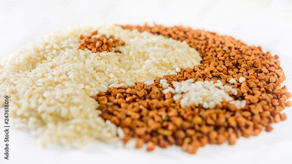Yin Yang is made using buckwheat grains on a white background, a texture Yin Yang is made using buckwheat grains on a white background, a texture