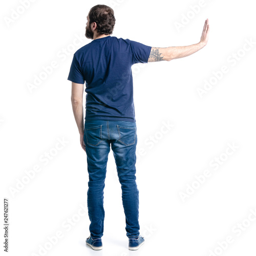 Man in jeans rejects on white background isolation, back view