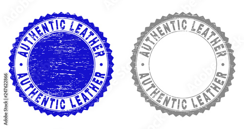 Grunge AUTHENTIC LEATHER stamp seals isolated on a white background. Rosette seals with grunge texture in blue and gray colors. Vector rubber imitation of AUTHENTIC LEATHER text inside round rosette.