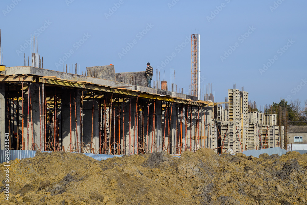 Construction of a residential building, reinforced concrete structures