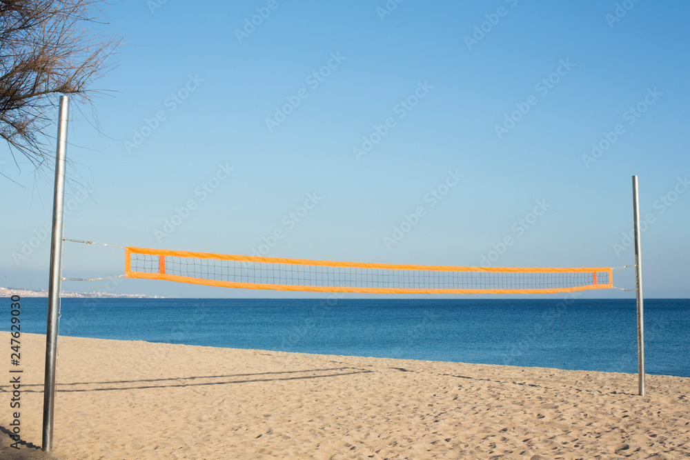 Beach volleyball net a sunny day on the sea