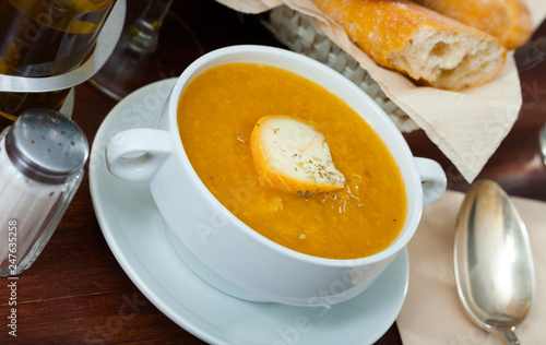 Cream soup with vegetables and soft cheese
