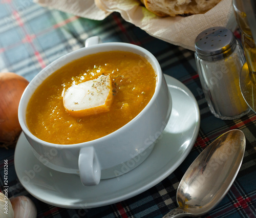 Cream soup with vegetables and soft cheese