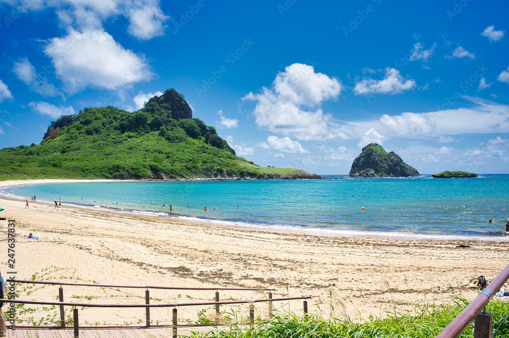 Beach view with mountains and blue sea, travel life