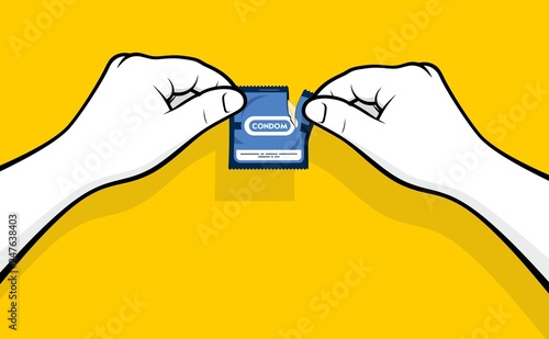 Man hands opening condom
