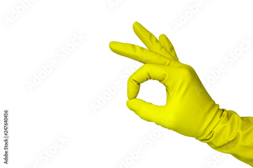 Close up view of human hand with rubber glove showing ok isolated on white background.