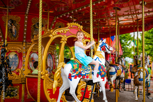 Blonde girl and ginger boy in the enterteiment park. RUSSIA, SOCHI, Sochi-park, june 2018 photo