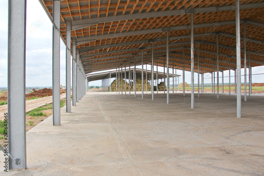 Part of the building structure of galvanized parts. Galvanized parts on a construction site in sunny weather. Installation of metal structures. Galvanized metal is not exposed to corrosion. Part of the building structure of galvanized parts. Galvanized parts on a construction site in sunny weather. Installation of metal structures. Galvanized metal is not exposed to corrosion.