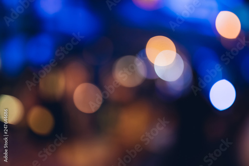 Abstract bokeh or blurred lights background. Night club light blur bokeh, defocused background. Bokeh and flare of blurred background night scene in concert party