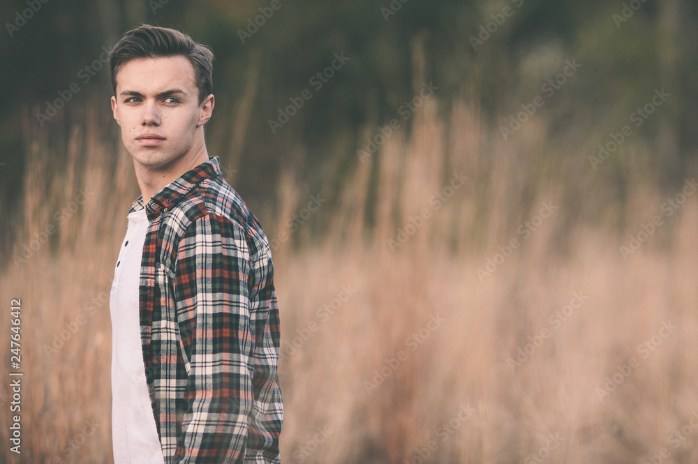 Young man at the park in the fall Young man at the park in the fall