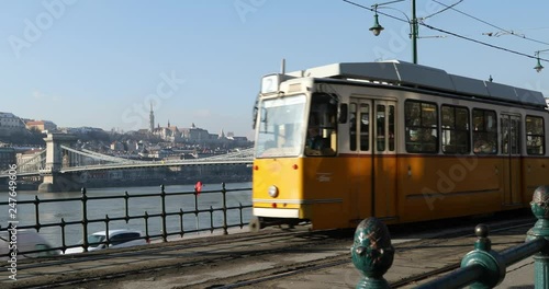 Budapest, Hungary, March 15 jan 2019 Old yellow Tram and chain bridge