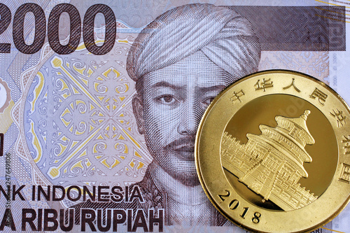 Bilde på lerret A close up image of an Indonesian two thousand rupiah note with a Chinese one ou