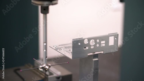 Quality control, CMM measuring device in a manufacturing plant.