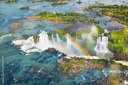 Beautiful aerial view of Iguazu Falls from the helicopter ride  one of the Seven Natural Wonders of the World - Foz do Igua  u  Brazil
