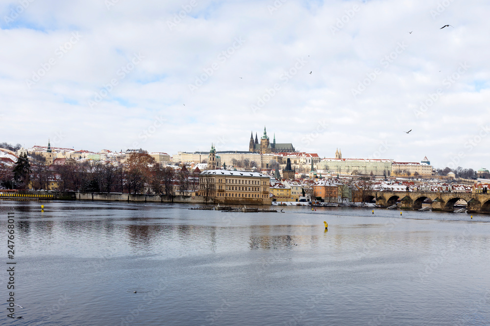 Snowy Prague Lesser Town with Prague Castle and Charles Bridge, Czech republic