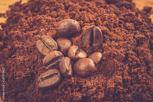 Macro photo of Coffee beans and ground coffee powder