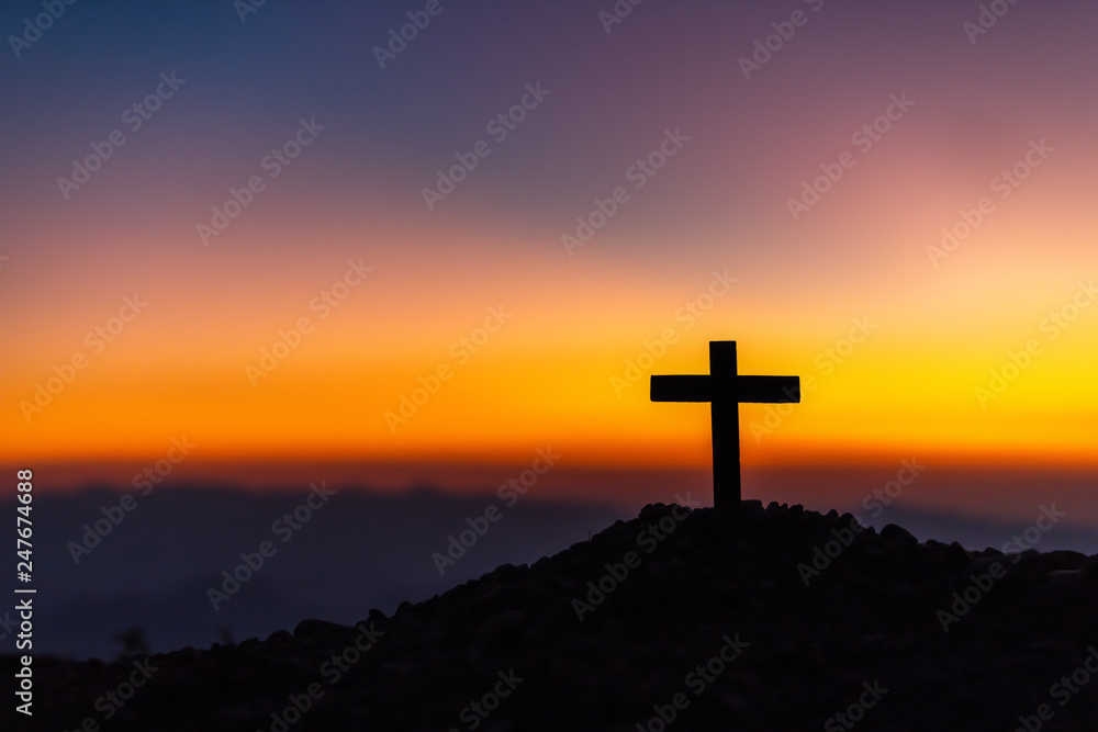 Symbol of God love to people the mountain at sunset