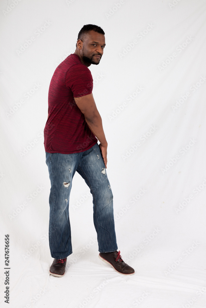 Thoughtful Black man in red shirt Thoughtful Black man in red shirt