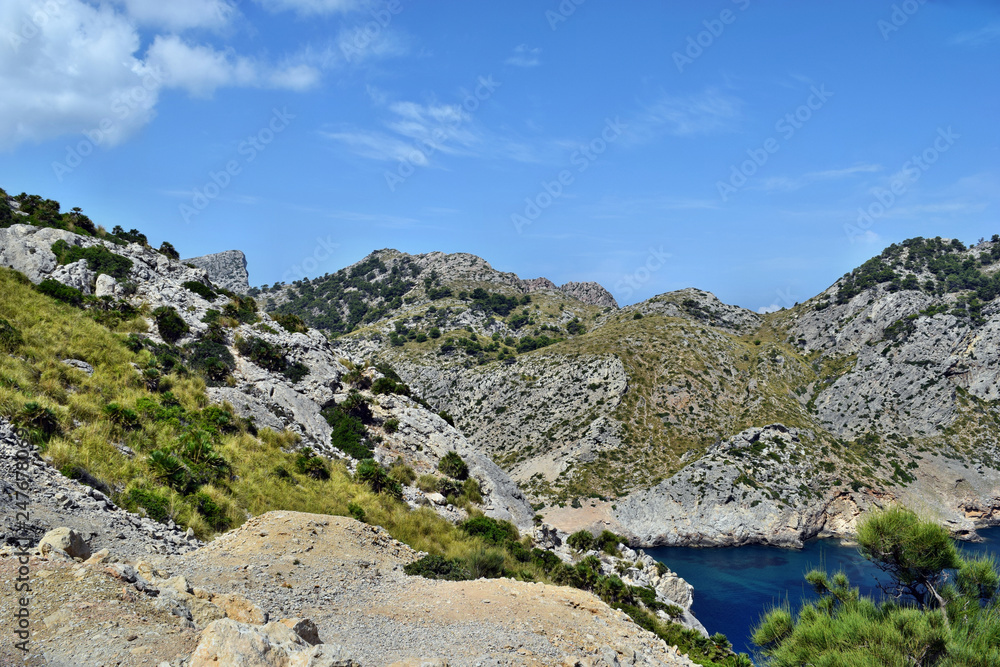 Beautiful sea bay with turquoise water, beach and mountains, Cala Figuera on Cap Formentor