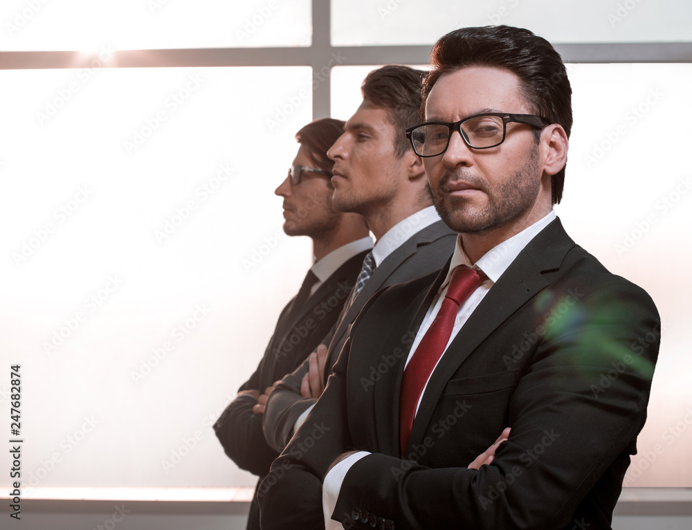 side view.a group of business people looking at a copy space side view.a group of business people looking at a copy space