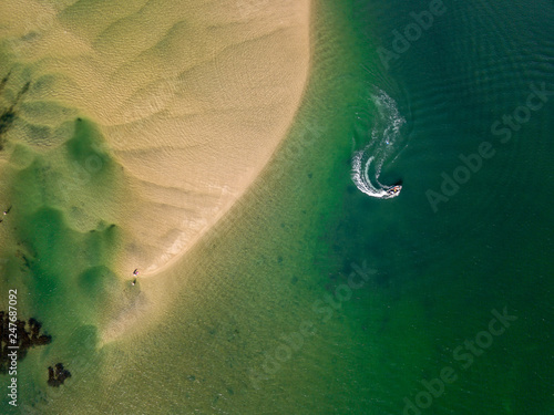 Boats Driving along water from above