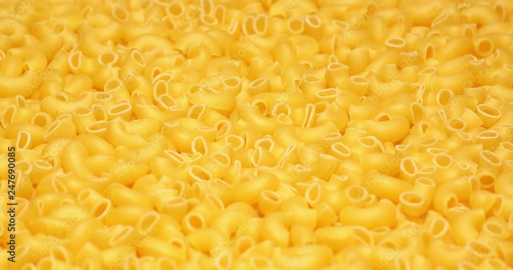 C4K closeup shot of the dry Lumachine pasta on a rotating stand C4K closeup shot of the dry Lumachine pasta on a rotating stand