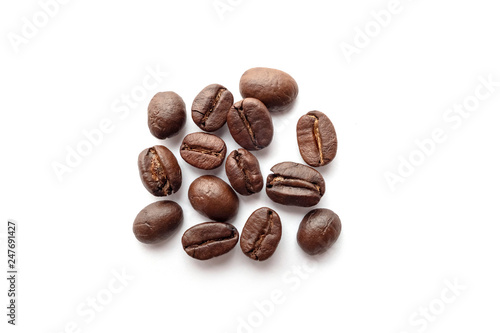 Coffee beans isolated on white background. Close-up.