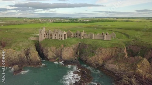 Aerial view of a Slains Castle ruin at sunrise, Aberdeenshire, Scotland photo