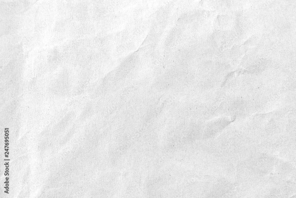 White crumpled paper texture background. Close-up. White crumpled paper texture background. Close-up.