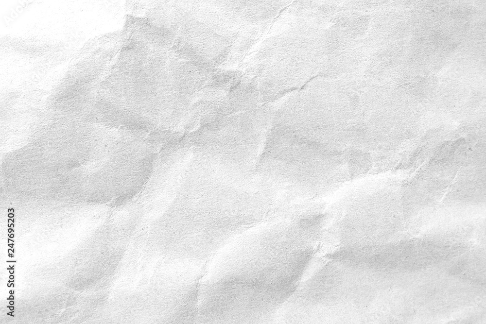 Naklejka premium White crumpled paper texture background. Close-up.