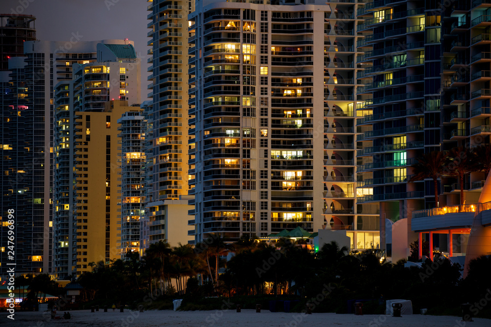  Modern Buildings at Night, Sunny Isles Beach. Close up view.