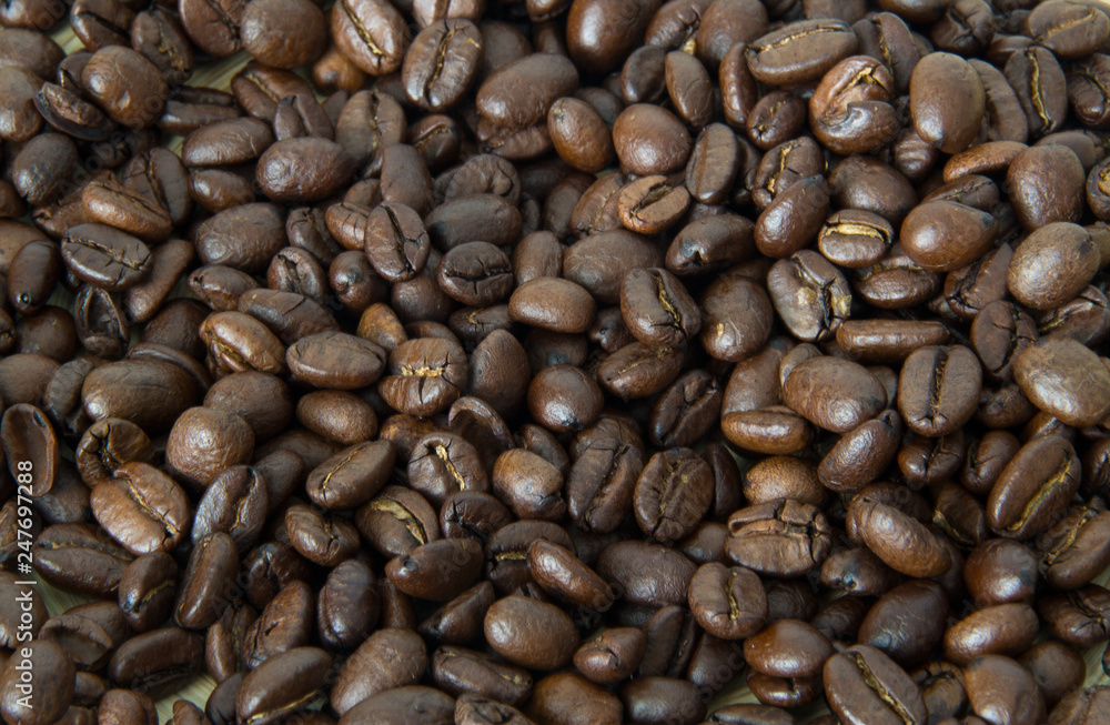 Whole grains of coffee close-up Whole grains of coffee close-up