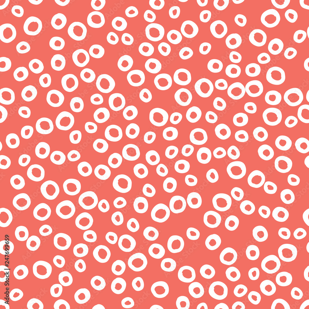 Seamless pattern background in trendy color of 2019, living coral, endless hand drawing abstract doodle of dots or circles, ovals, bubbles or snow, this year. Vector. Seamless pattern background in trendy color of 2019, living coral, endless hand drawing abstract doodle of dots or circles, ovals, bubbles or snow, this year. Vector.