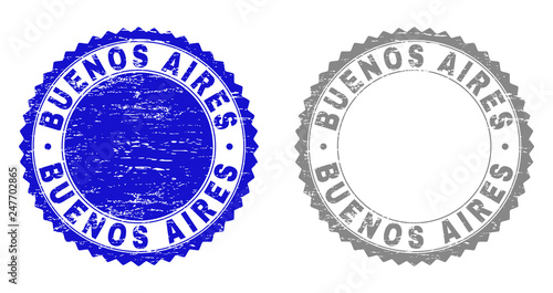 Grunge BUENOS AIRES stamp seals isolated on a white background. Rosette seals with grunge texture in blue and grey colors. Vector rubber imitation of BUENOS AIRES title inside round rosette.