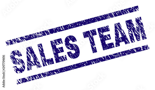 SALES TEAM seal print with distress style. Blue vector rubber print of SALES TEAM text with unclean texture. Text tag is placed between parallel lines.
