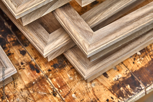 Wood door manufacturing process. Wooden moldings for entrance door. Furniture manufacture.