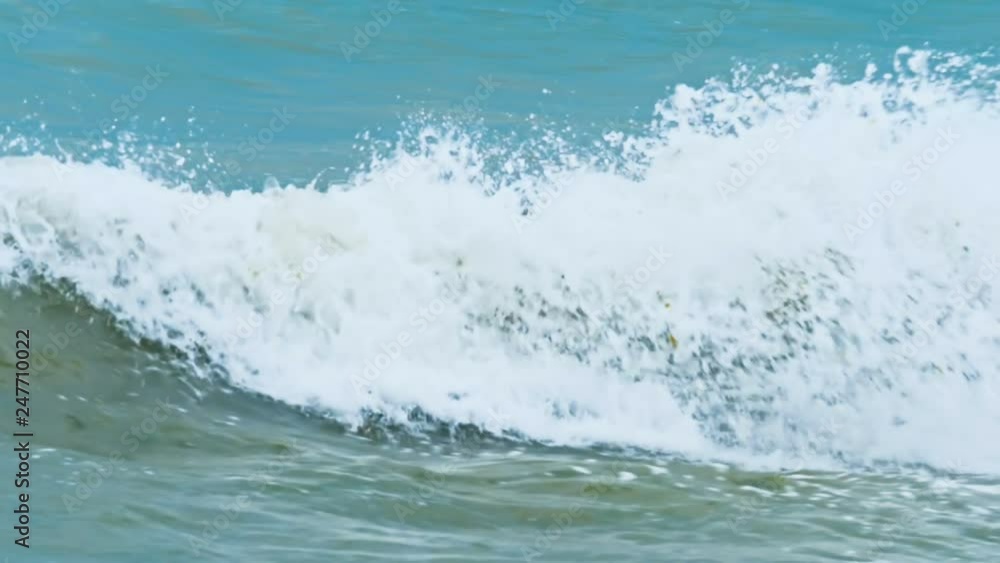 Sea waves crashing against the rocks Sea waves crashing against the rocks