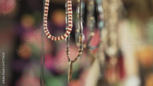 Slowmotion Necklaces at a Goa Booth photo