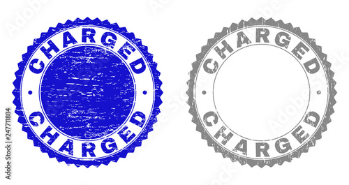 Grunge CHARGED stamp seals isolated on a white background. Rosette seals with grunge texture in blue and gray colors. Vector rubber watermark of CHARGED label inside round rosette.