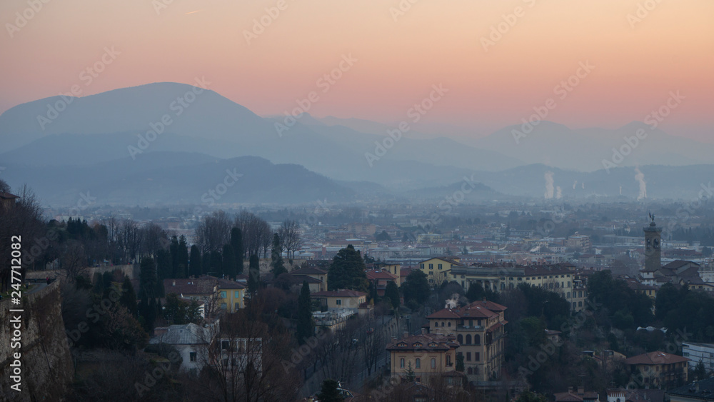 Bergamo, Italy. Landscape to the new city (downtown) at the sunrise from the old town located on the top of the hill