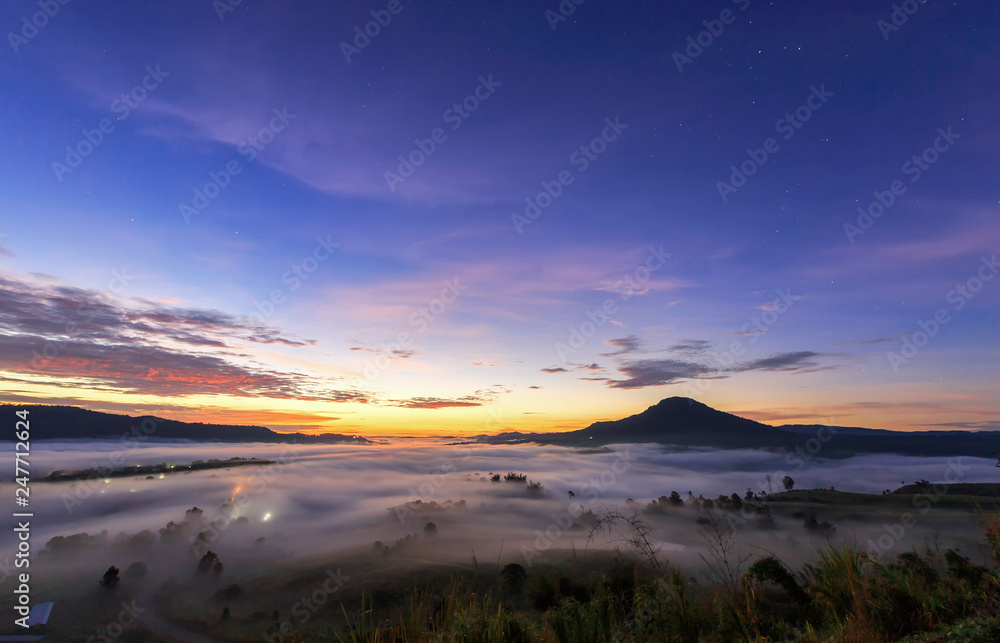 Fototapeta premium Sunrise over fog in the morning