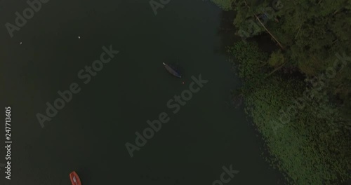 Drone over a beautiful lake and mountains in the bavaria/germany at sunrise photo