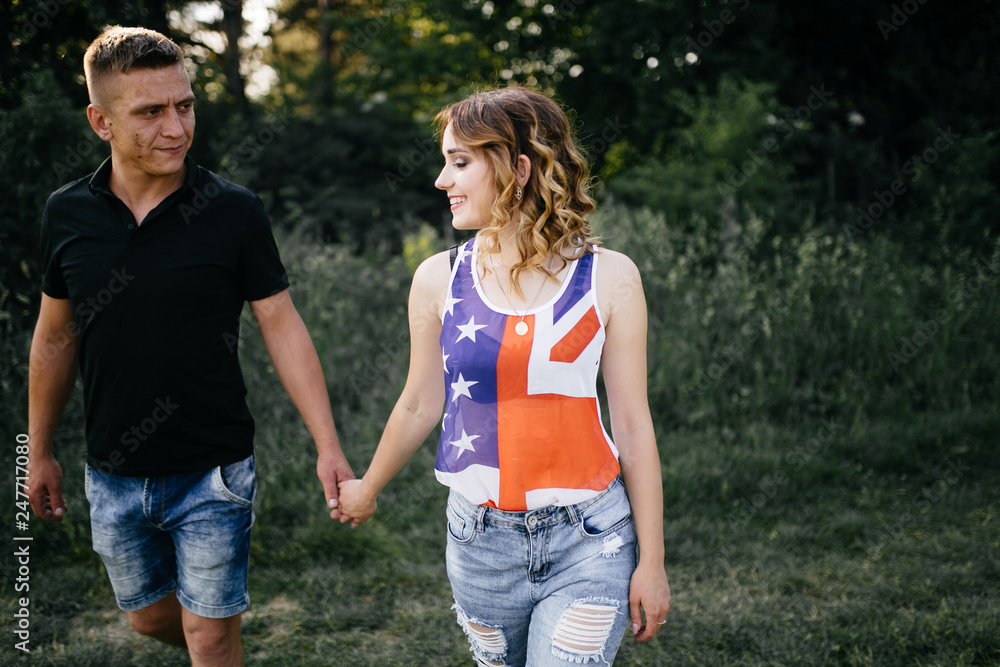 Portrait of a happy young couple enjoying a day in the park together